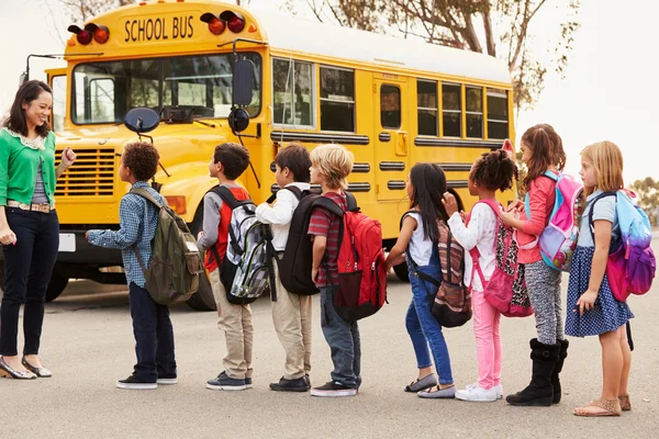 kids lining up for school | eBacon keep kids safe around construction sites